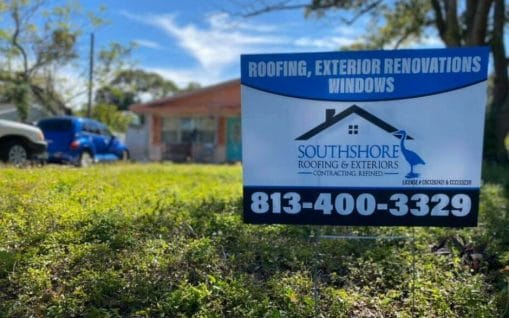 SouthShore Roofing Contractors with the team outside an house in Tampa. SouttShore provides roofing for most common roofing materials such as stone coated steel roofing, membrane roofing, slate roof and rolled roofing. 