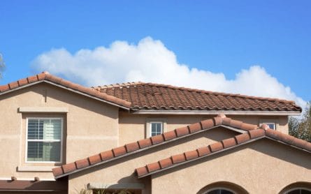 Concrete tile roof installed in Tampa, florida providing thermal insulation to the built up roofs house saving energy costs and potential to last more than a century.  